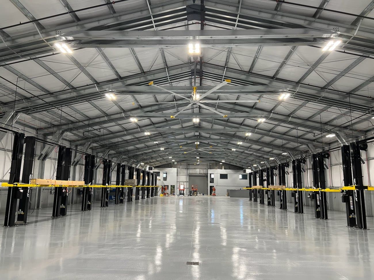 Interior of a steel building with bare Galvalume girts and purlins.